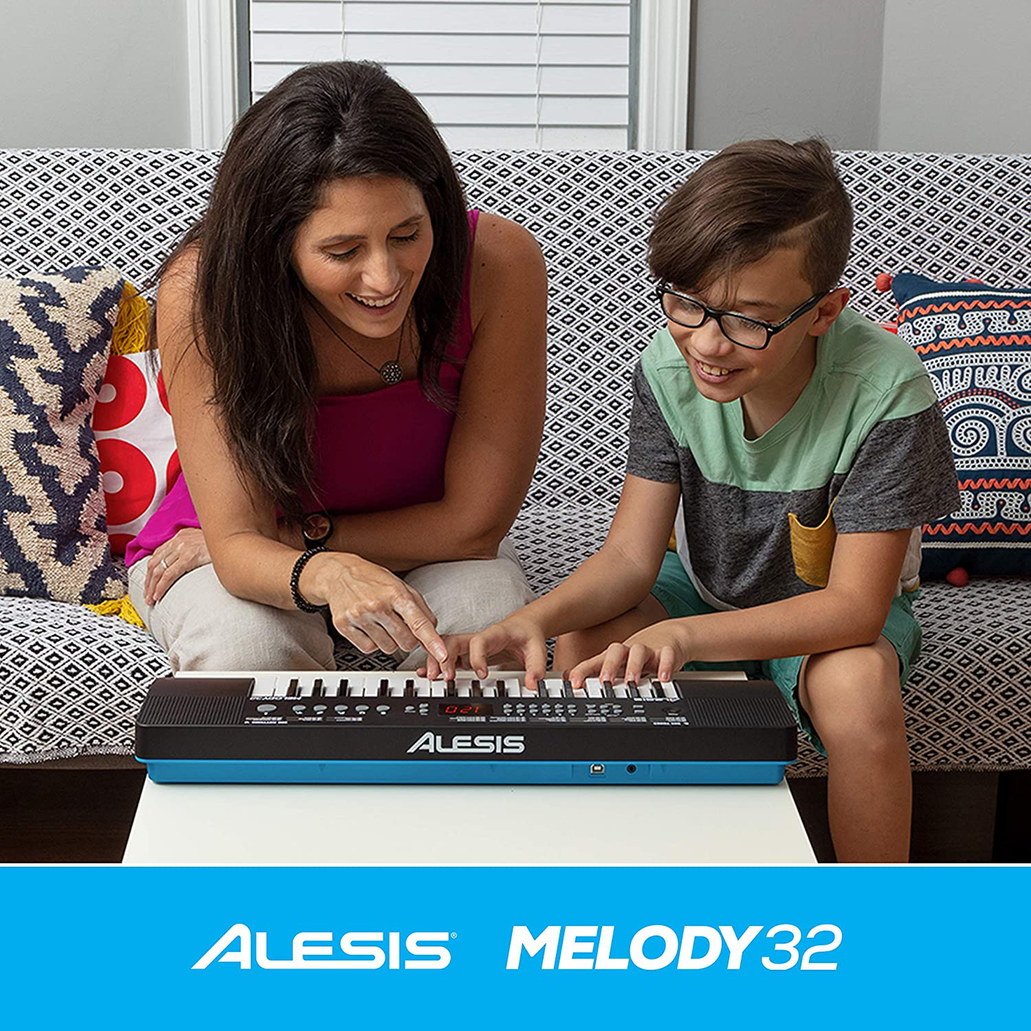 Alesis Melody 54 - Electric Keyboard Digital Piano with 54 Keys, Speakers, 300 Sounds, 300 Rhythms, 40 Songs, Microphone and Piano Lessons