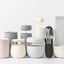 W&P Porter Ceramic Mug W/ Protective Silicone Sleeve, Blush 16 Ounces | On-The-Go | Reusable Cup for Coffee or Tea | Portable | Dishwasher Safe