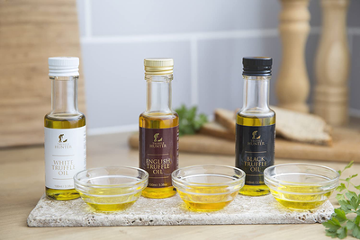 Trufflehunter Truffle Oil Selection Gift Set - White, English & Black Truffle Oil (3 X 3.38 Oz) Real Truffle Pieces Olive Oil Gourmet Food Seasoning Marinade - Vegetarian Vegan Kosher & Gluten Free